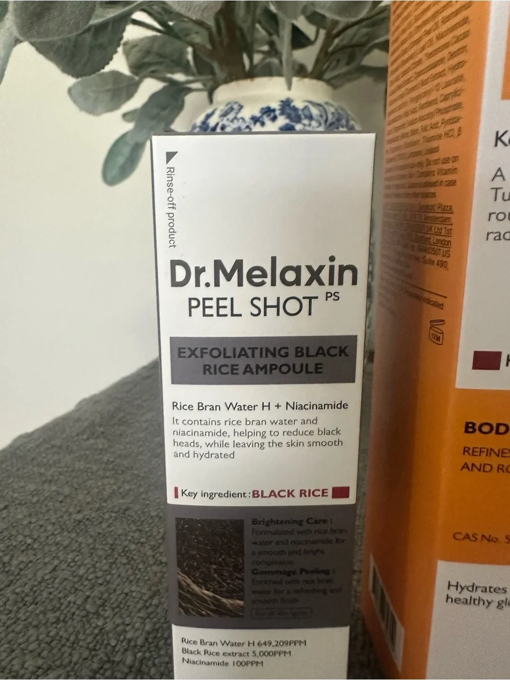 Dr. Melaxin Peel Shot Exfoliating Kojic Acid Turmeric Spray and black rice